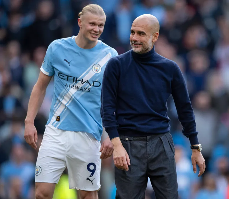 Pep Guardiola y Haaland comentan el triunfo del Manchester City contra el Arsenal. Pep Guardiola y Haaland comentan el triunfo del Manchester City contra el Arsenal.